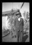 Photograph: [Byrd Jr. standing in a yard]
