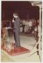 Thumbnail image of item number 1 in: '[Don Baker standing in front of podium]'.