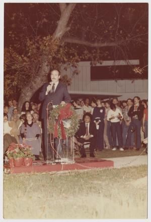 Primary view of object titled '[Don Baker standing in front of a lectern]'.