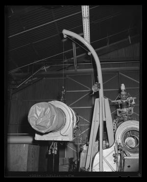 Primary view of object titled '[Engine of H-40 on a hoist]'.