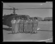 Photograph: [Crew of YH-70 #7 standing with Army personnel in front of helicopter]