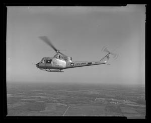 Primary view of object titled '[First flight of XH-40 #3 over Hurst plant]'.