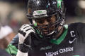 Photograph: [Mean Green Football Player in Game Gear]