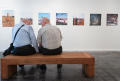 Photograph: [Don Shugart and Ray Bankston Conversing at Exhibit]