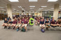 Photograph: [Westlake Academy Charter School students sitting in the Willis Libra…