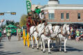 Photograph: [Cowboys Riding Horses in the Homecoming parade]