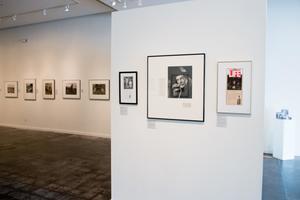 Primary view of object titled '[Three Photographs at an Exhibit]'.