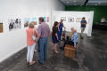 Photograph: [Exhibition Attendees Conversing]