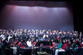 Photograph: [Group picture of a choir and an orchestra on stage, 2]