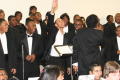 Photograph: [Choir members look toward conductor]