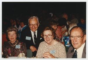 Primary view of object titled '[Photograph of Four People at the 1990 WASP Reunion]'.