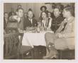 Photograph: [Miss Kilgore and unidentified group of men]