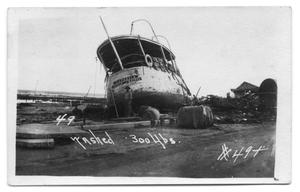 Primary view of object titled '[Boat Damaged from Storm]'.