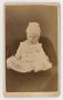 Photograph: [Unknown Baby in Dress and Hat]
