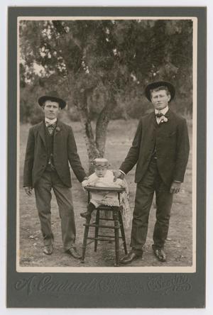 Primary view of object titled '[Two Men with Baby]'.