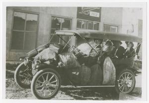 Primary view of object titled '[Photograph of People in a Car]'.