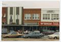 Photograph: [Shops on the North Side of the Square]