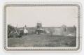 Photograph: [Cowhand Campsite with Chuckwagon and Tent]