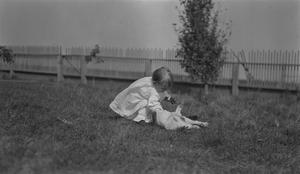 Primary view of object titled '[Baby with Cat]'.