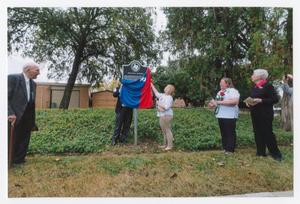 Primary view of object titled '[Elise Clements Unveiling the Beulah Harriss Texas Historical Marker]'.