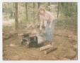 Primary view of [Woman Dousing a Campfire]
