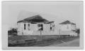 Primary view of [A damaged house after the 1947 Texas City Disaster]