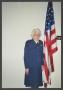 Photograph: [Charlyne Creger and U.S. Flag]