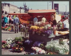 Primary view of object titled '[Woman at Flower Stand]'.