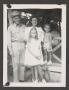Photograph: [Man in uniform with Woman And Children]