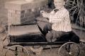 Photograph: [Boy with Pedal Car]