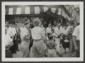Thumbnail image of item number 1 in: '[Family in Busy Street]'.