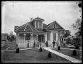 Photograph: [Portrait of Group and Gus Schumacher Residence]