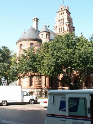 Primary view of object titled '[Van In Front of Courthouse]'.
