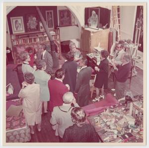 Primary view of object titled '[Aerial View of John Hutton and Visitors in his Studio]'.