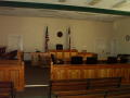 Photograph: [Furniture in a Courtroom]