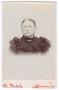 Photograph: [Portrait of an Older Woman Wearing Dark Clothing]