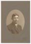Photograph: [Portrait of a Young Man Wearing a Dark Color Tweed Jacket]