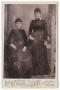 Photograph: [Two Unknown Women Wearing Dark Clothing]