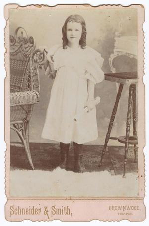 Primary view of object titled '[Young Girl Holding Rolled Paper in Her Hand]'.