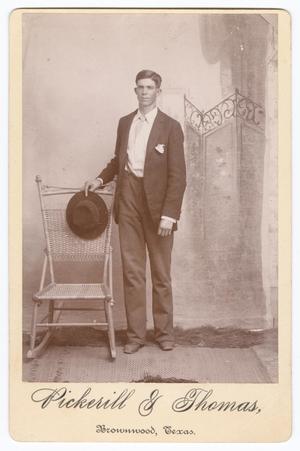 Primary view of object titled '[Unknown Young Man Holding a Hat]'.