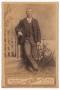 Photograph: [Portrait of an Unknown Man Standing Outdoors]