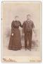 Primary view of [Unknown Man and Woman Wearing All Dark Clothing]