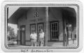 Primary view of [Two men waiting at the Pineland railroad station]