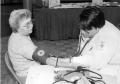 Thumbnail image of item number 1 in: 'Associate degree in nursing; a student measures blood pressure during Lee College mall exhibit.'.