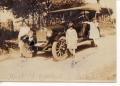 Photograph: [Children Posing by a Car]