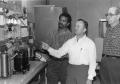 Primary view of [Air conditioning instructor Bennie Sparkman with Reuben Edwards (from left) and Dave Clark.]