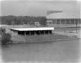 Photograph: [Building on the Colorado River and Palmer Auditorium]