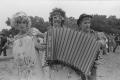 Photograph: [People Posing with an Accordion]