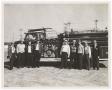 Photograph: [Men in Front of Truck]