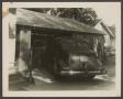 Photograph: [Car in a Driveway]